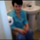 A brief, low-quality, fuzzy video of some guy breaking into a bathroom, revealing his wife sitting on the toilet and making some loud, wet fart sounds. Audio is pretty good.